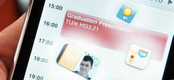 A phone showing a day schedule with a graduation presentation at TU/e.